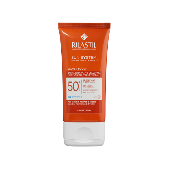 A tube of Rilastil Sun System SPF 50+ Velvet Touch Cream with a bright orange label.