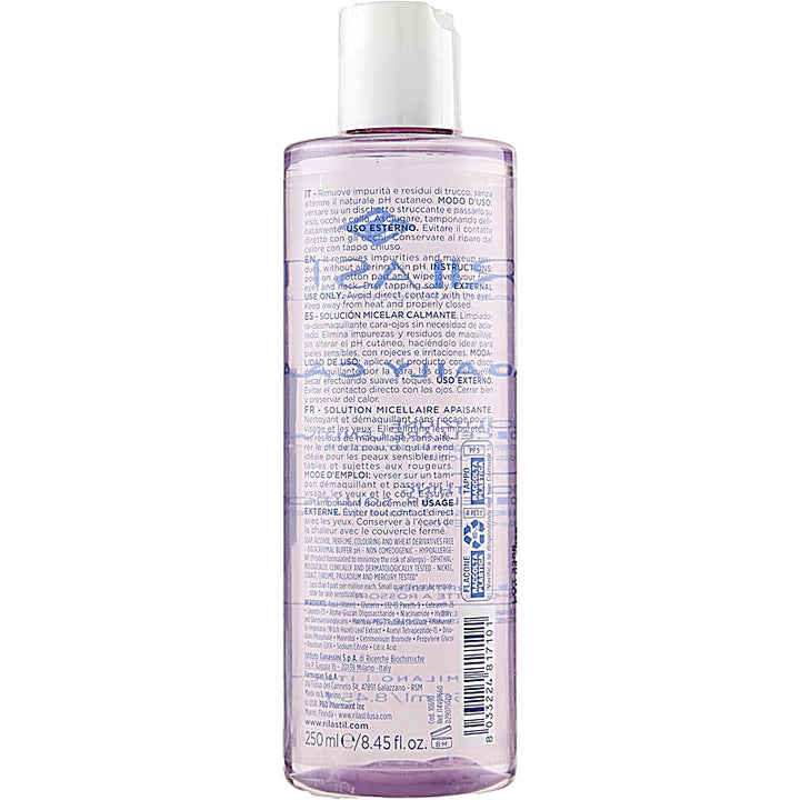 Back view of a purple bottle with text on a white background