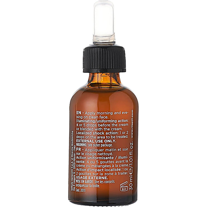 Brown glass bottle with black cap on a white background