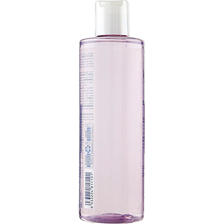 Clear bottle with a purple tint on a white background
