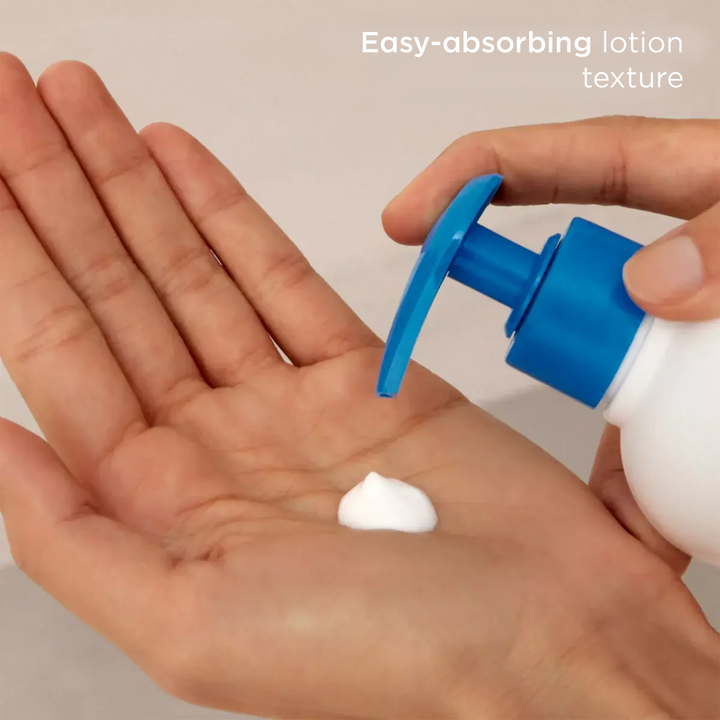 ISDIN Nutratopic Pro-Amp emollient body lotion with easy-absorbing texture on hand for atopic skin moisture and barrier restoration