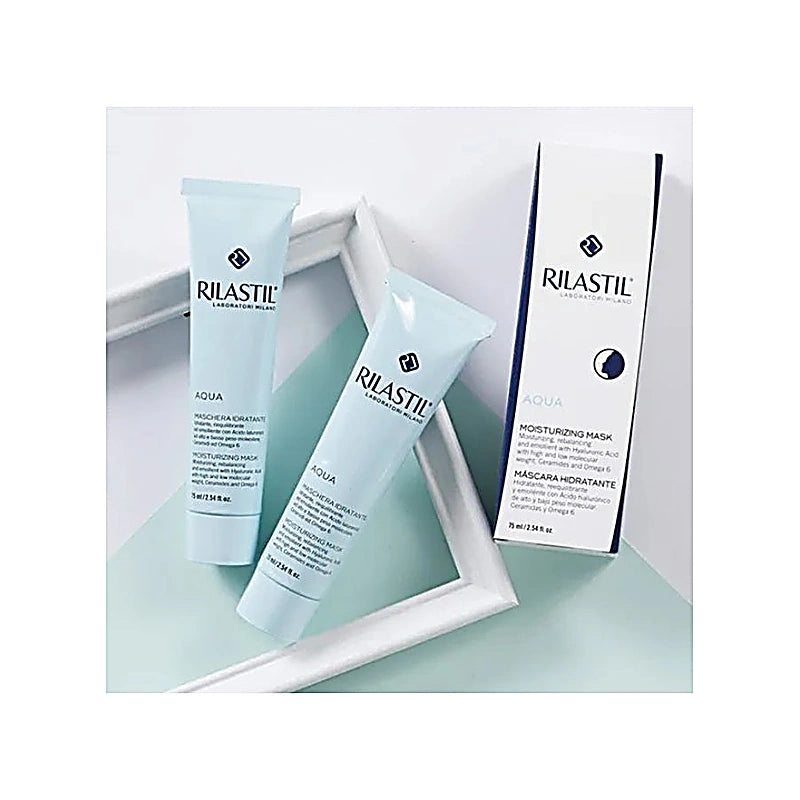 Rilastil skincare products including a mask and moisturizing cream on a light green surface.