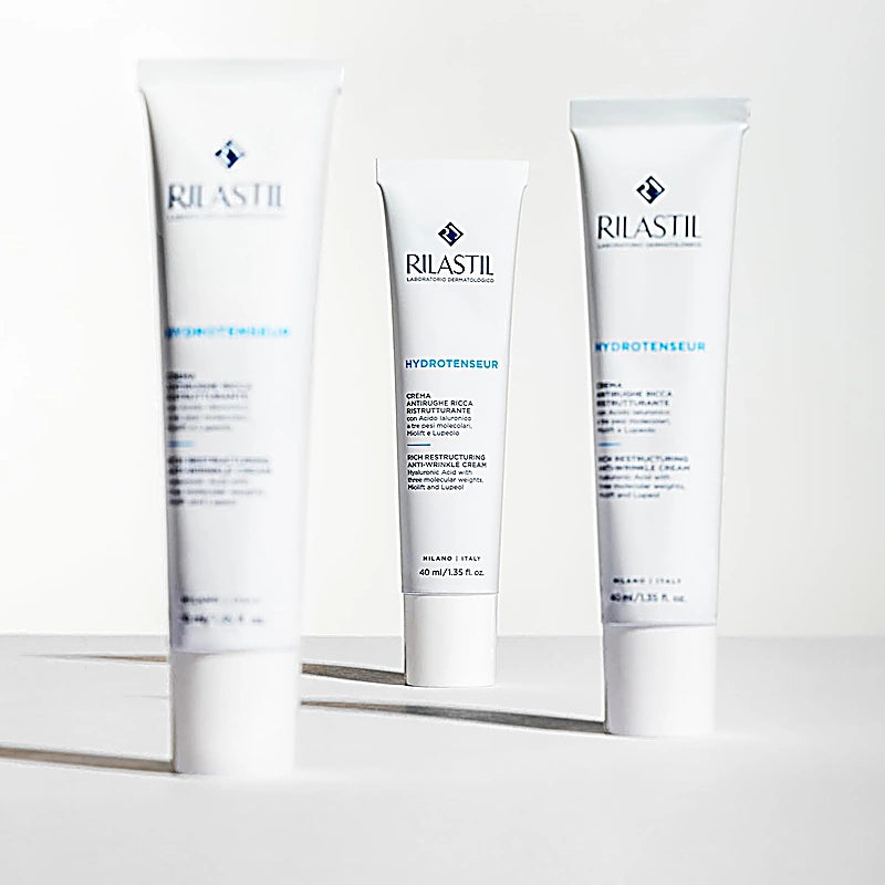 Three Rilastil skincare products on a white background