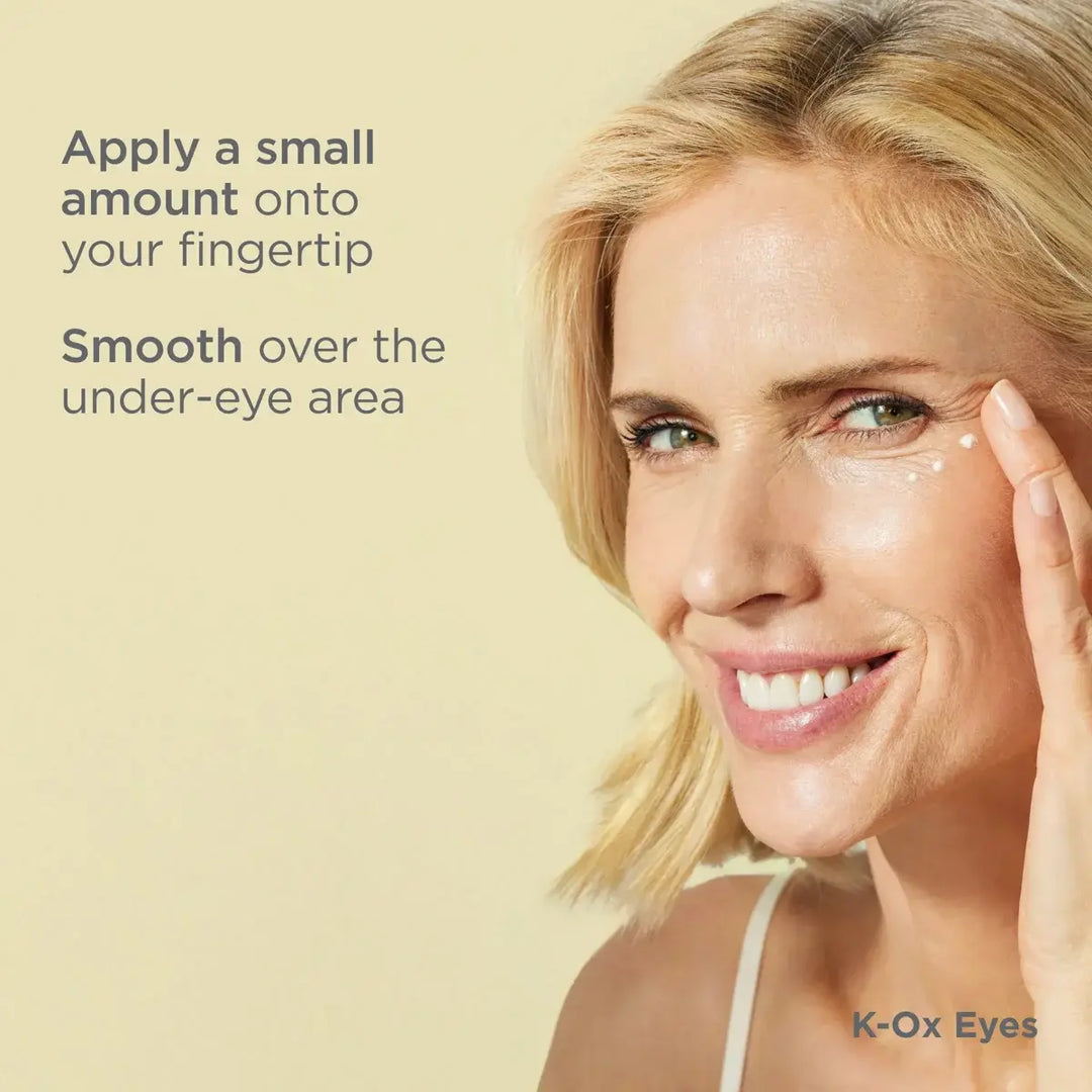 Woman applying ISDIN Isdinceutics Rejuvenate K-Ox Eyes Cream to under-eye area for reducing bags and dark circles