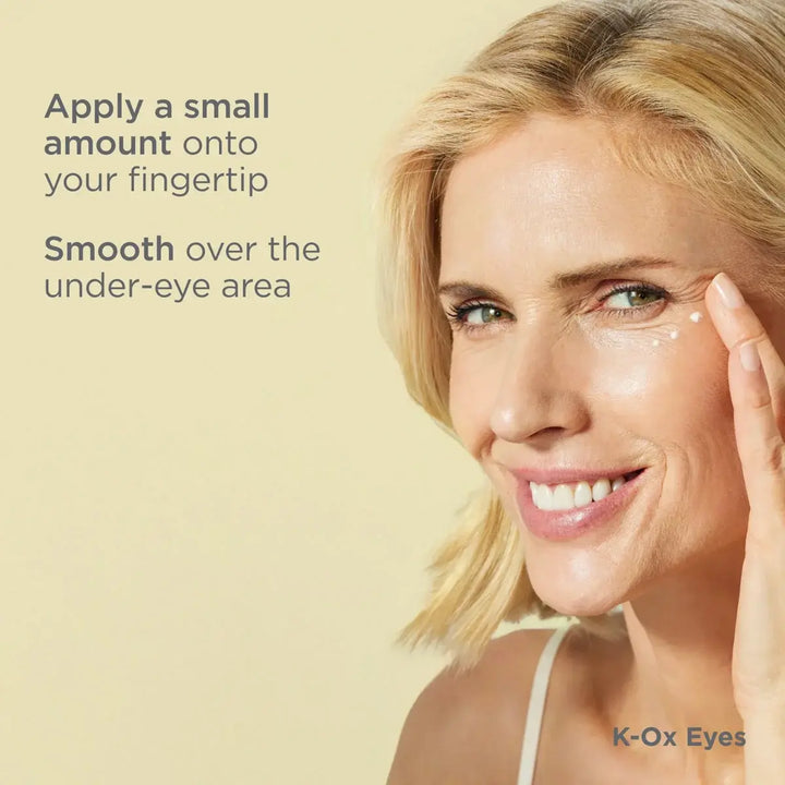 Woman applying ISDIN Isdinceutics Rejuvenate K-Ox Eyes Cream to under-eye area for reducing bags and dark circles