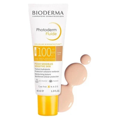 Bioderma Photoderm Max SPF50+ light cream tube with fluid sunscreen swatch for sensitive skin