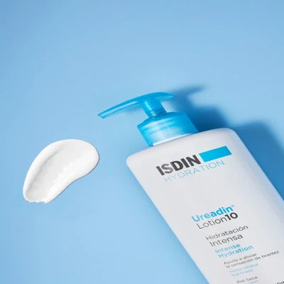 ISDIN Hydration Ultra10 Ureadin Lotion Plus 400ml with moisturizing cream on blue background