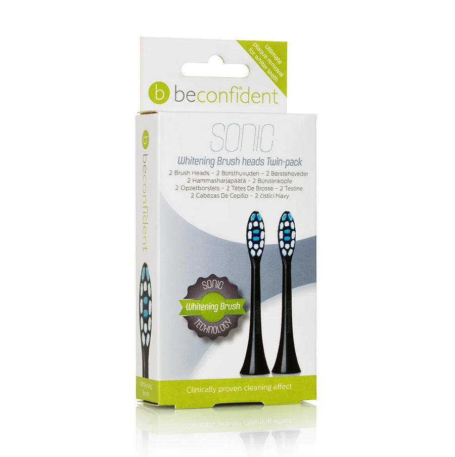 Packaging of Beconfident Sonic Whitening Brushhead Twinpack featuring two black toothbrush heads with bristles visible through the holes, displayed in a green and white box.